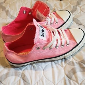 Converse All Star low top big tongue chucks.